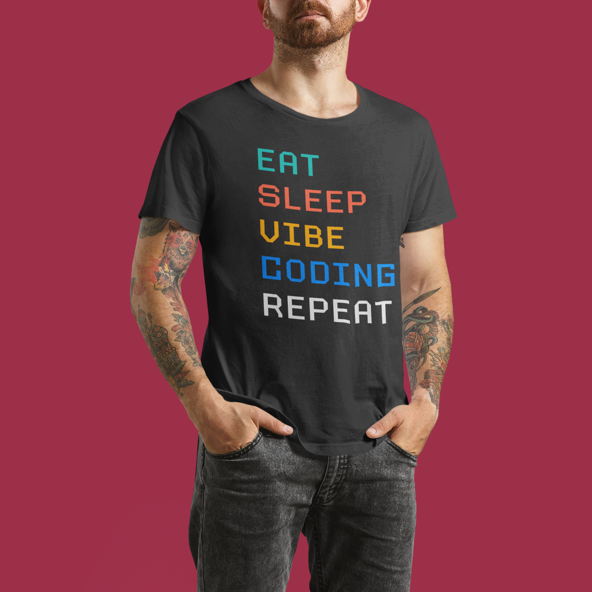 'Eat Sleep Vibe Coding Repeat' t-shirt in black, man wearing it on maroon background, funny gift for programmers
