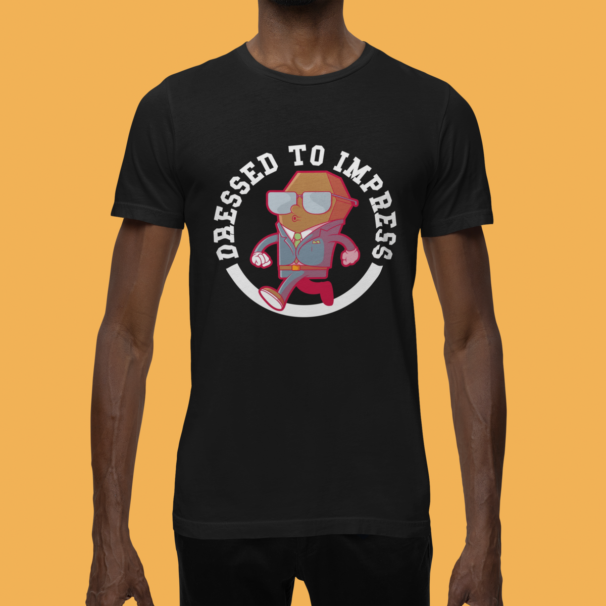 'Dressed To Impress' bear t-shirt in black, man wearing it on orange background