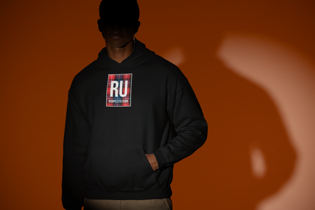 'RU Periodic Table Hoodie' in black, man under a spotlight, Hoodie mockup, Geekpsters