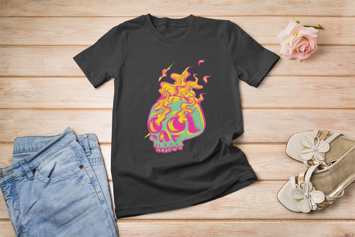 'Skull in Flames' psychedelic skull t-shirt in black, lifestyle flat lay on wood floor with sandals