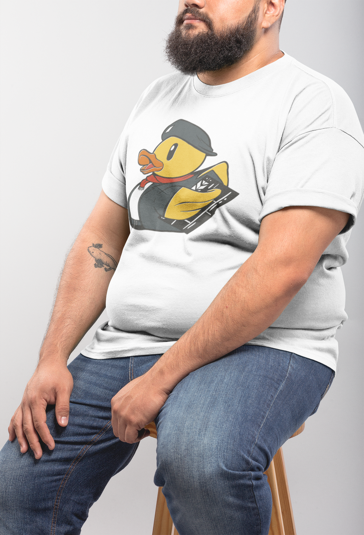 Director duck t-shirt in white, heavyset man model seated wearing it, funny movie director gift
