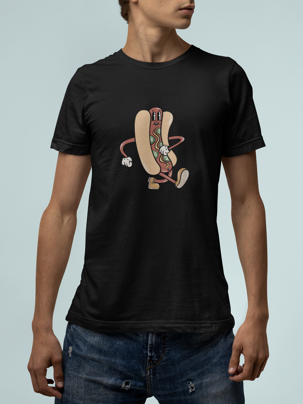 'Hotdog Cartoon' t-shirt in black, man wearing it with jeans, T-Shirt mockup, Geekpsters