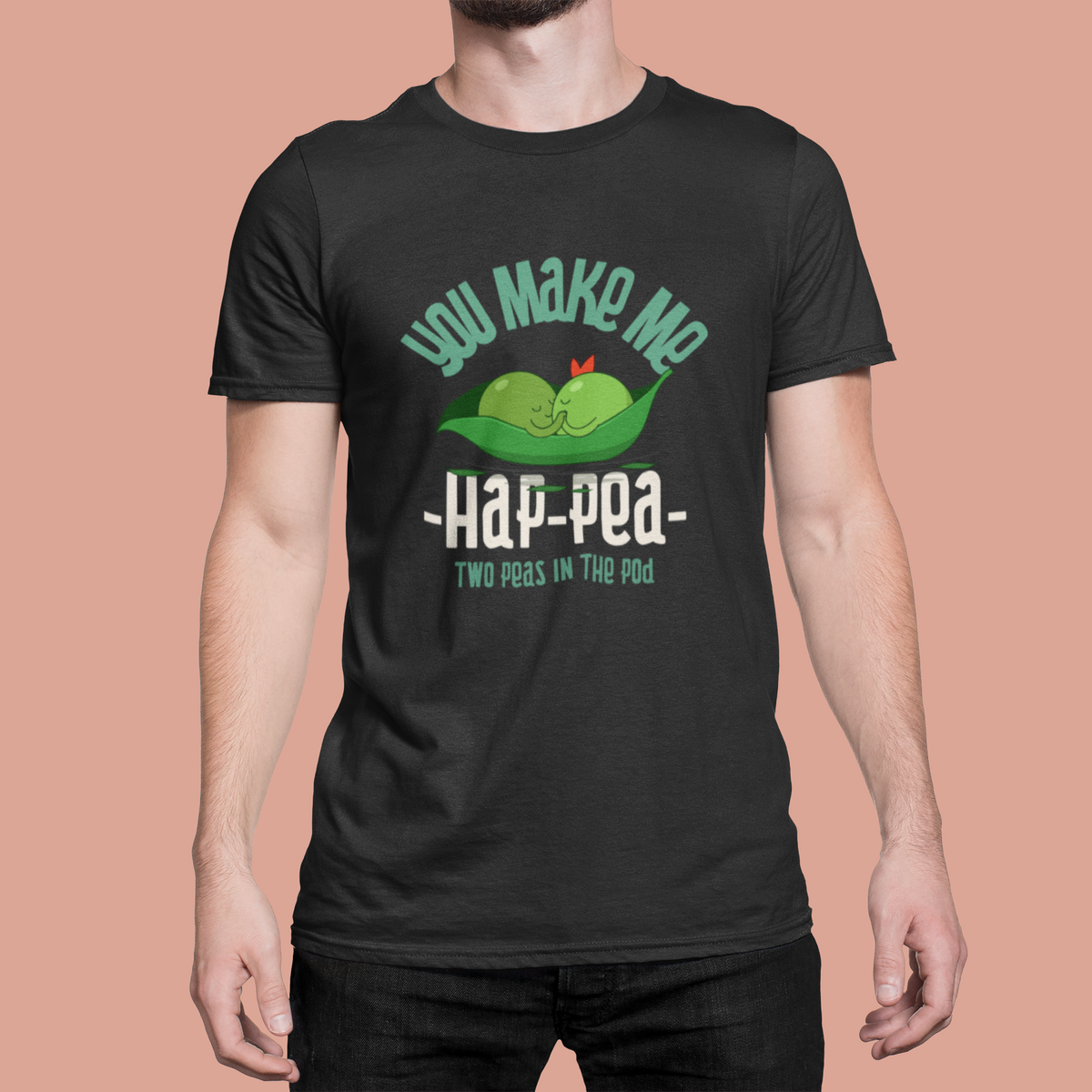 'You Make Me Hap-Pea' t-shirt in black, close-up of man wearing it, cute peas in a pod graphic tee