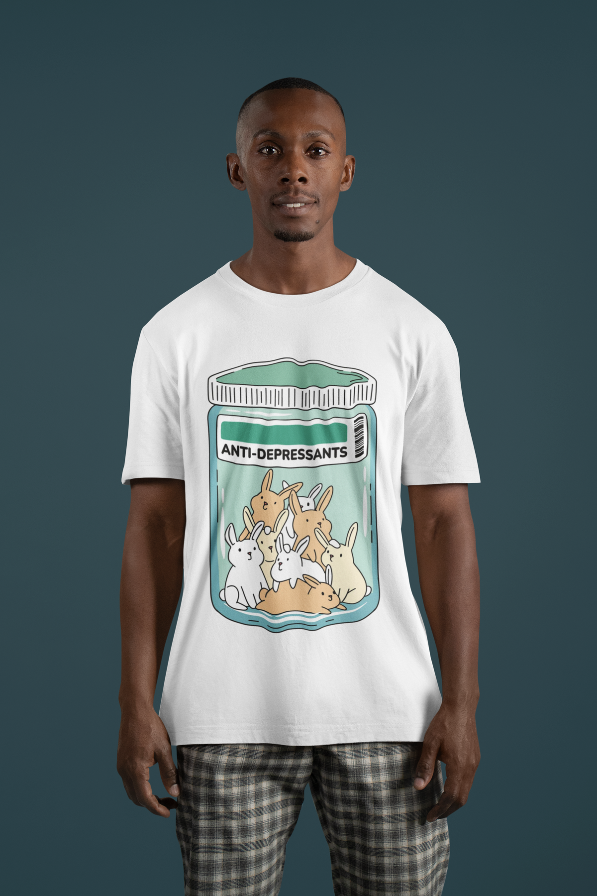 'Anti-Depressants' happy bunnies t-shirt in white, man model wearing it against a dark teal background