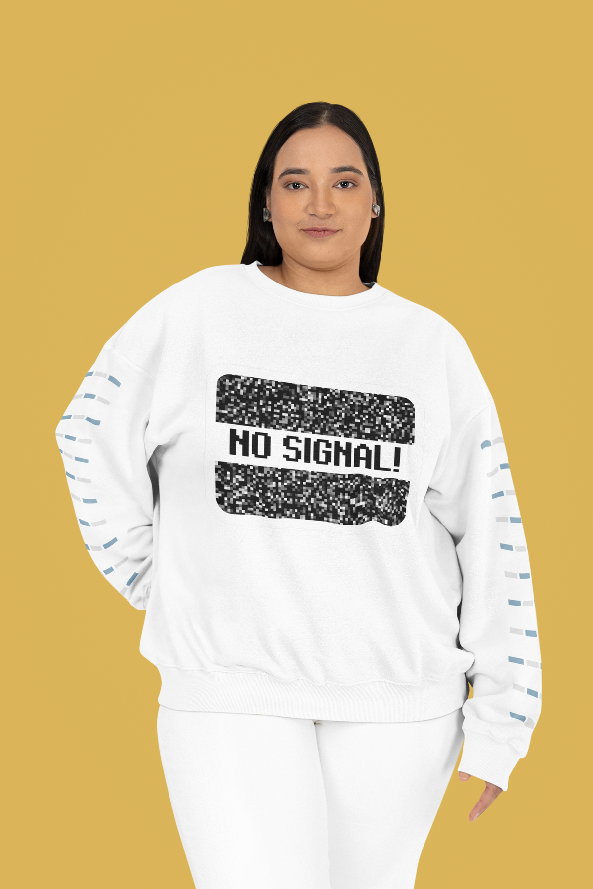 'No Signal' crewneck sweatshirt in white, curvy woman wearing it against mustard backdrop, funny TV lover gift