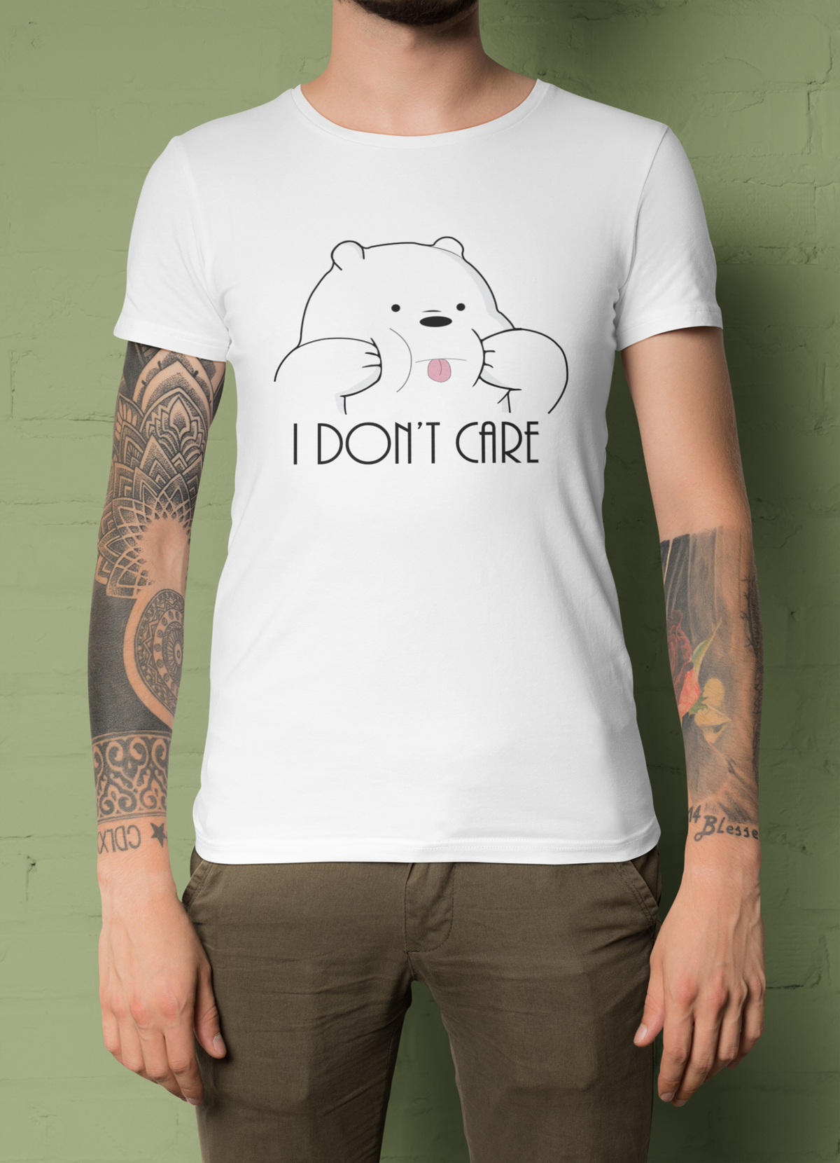 'I Don't Care' panda t-shirt in white, tattooed man wearing it outdoors, funny sarcastic graphic tee