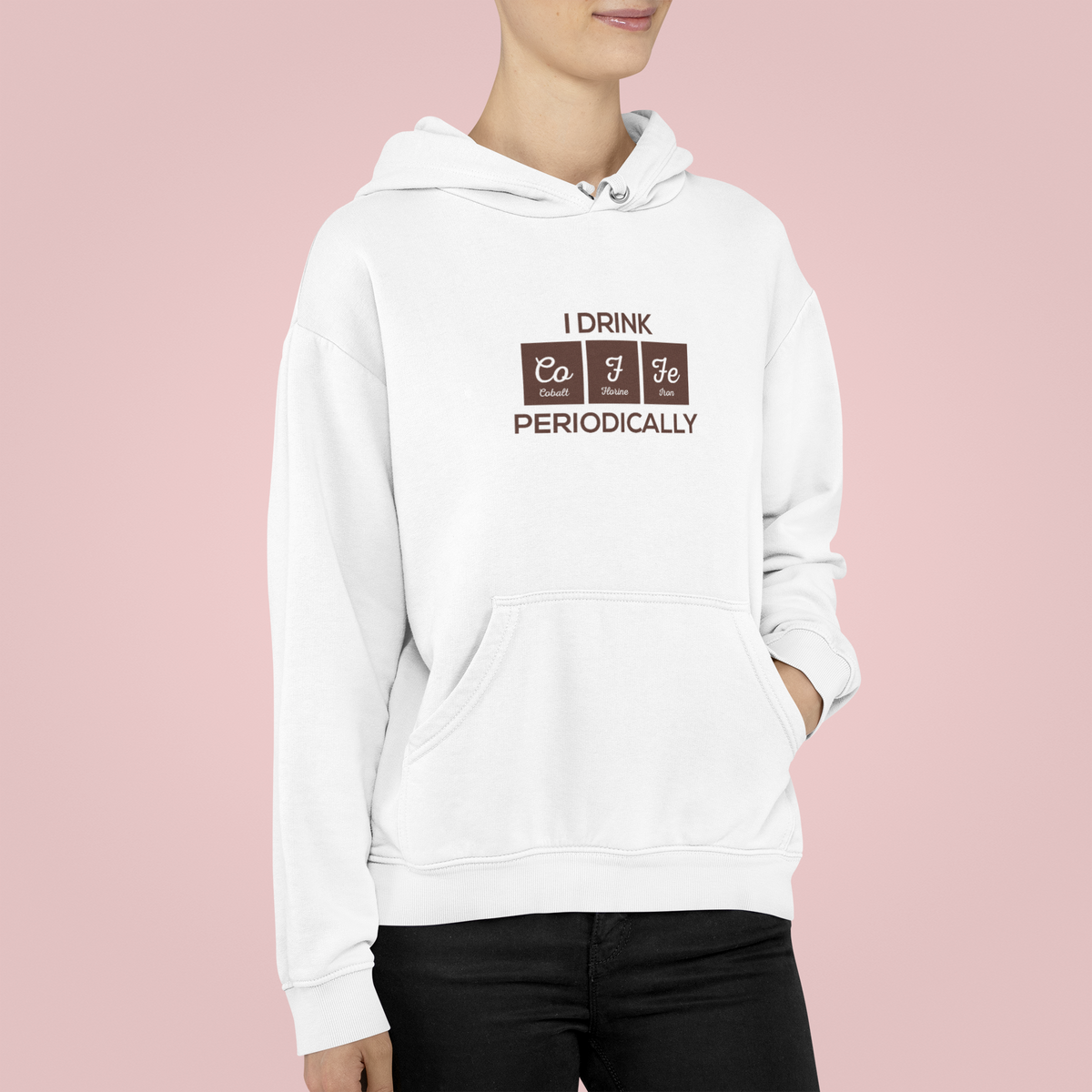 'I Drink Coffee Periodically' hoodie in white, woman wearing it against pink backdrop, funny chemistry pun gift
