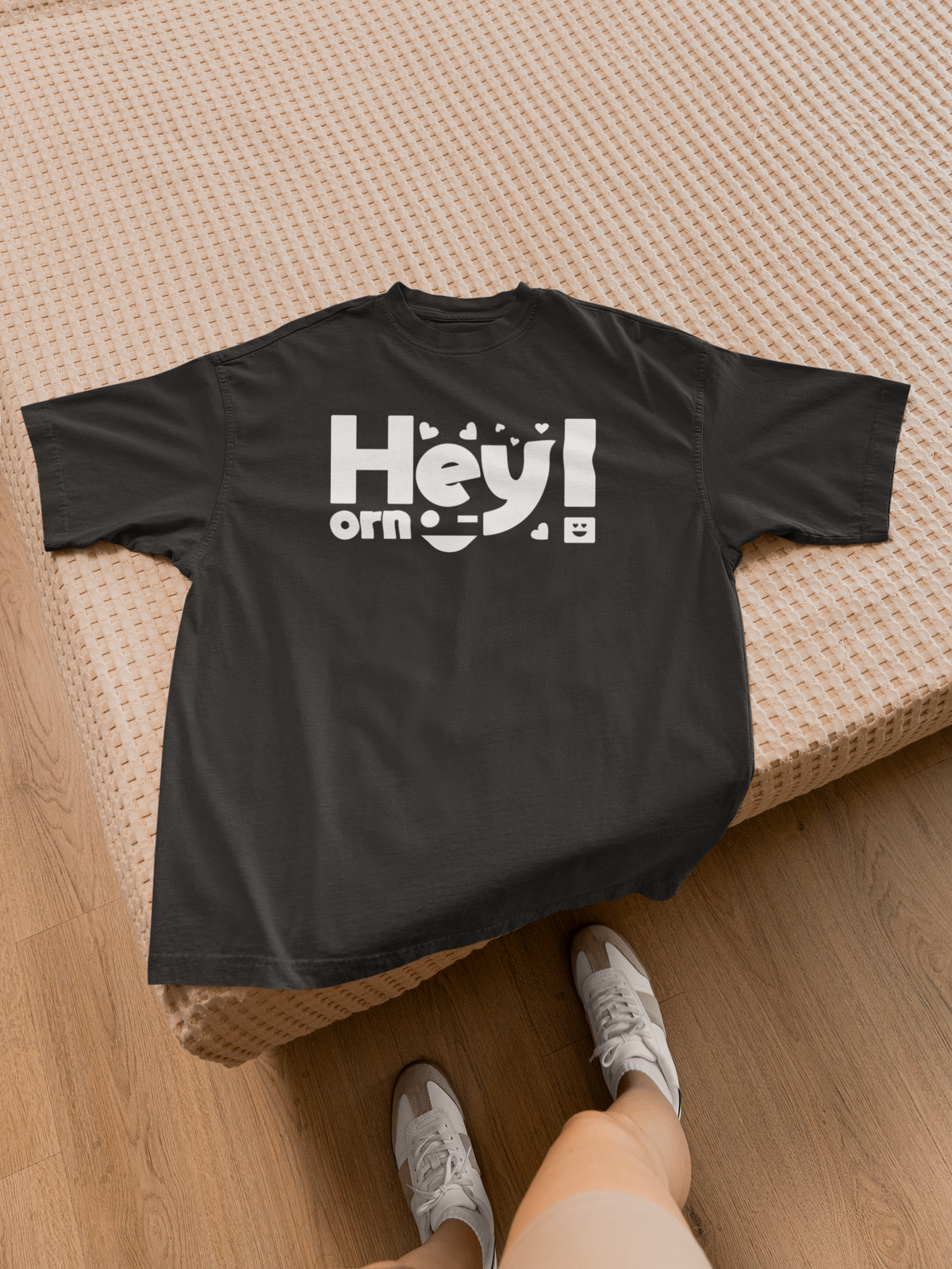 Hey design tee folded flat