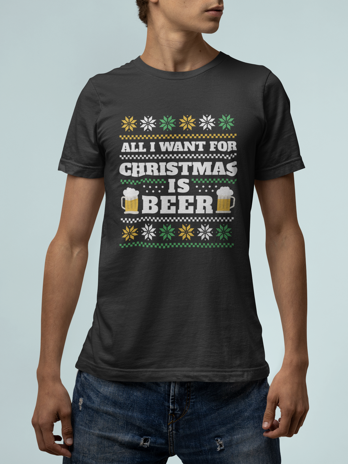 'All I Want For Christmas Is Beer' t-shirt in black, man wearing it on a tan background, funny gift