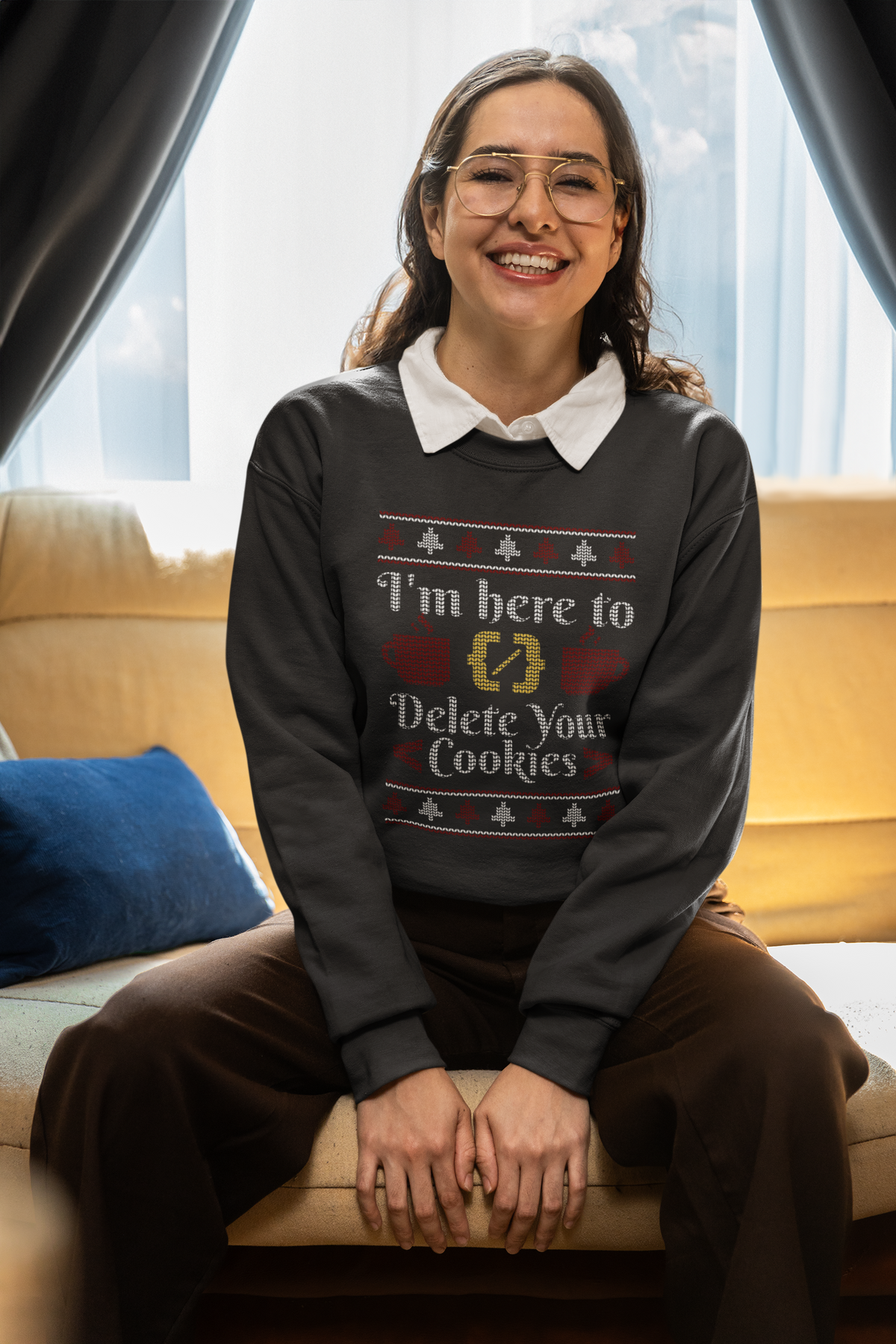 'I'm Here to Delete Your Cookies' sweatshirt in black, woman sitting at home wearing it, cozy programmer gift