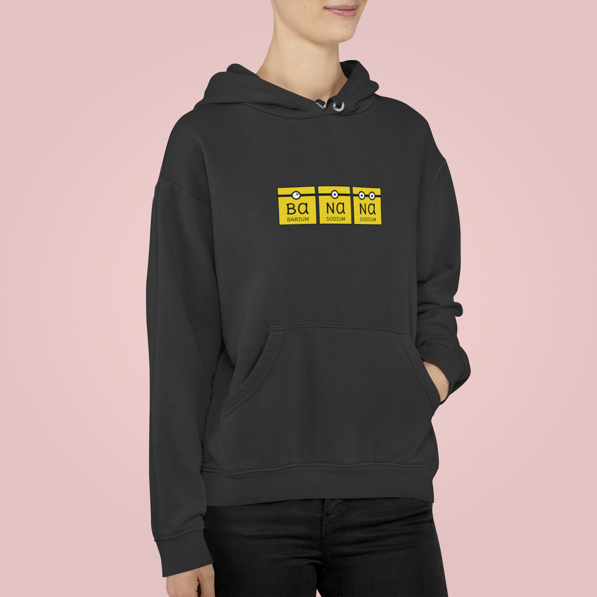 Ba-Na-Na periodic table banana element pun pullover hoodie, model wearing it in natural light