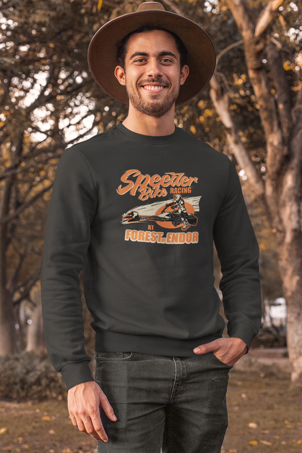 Speeder Bike Racing graphic sweatshirt in dark grey, man in a hat wearing it outdoors, Star Wars fan gift