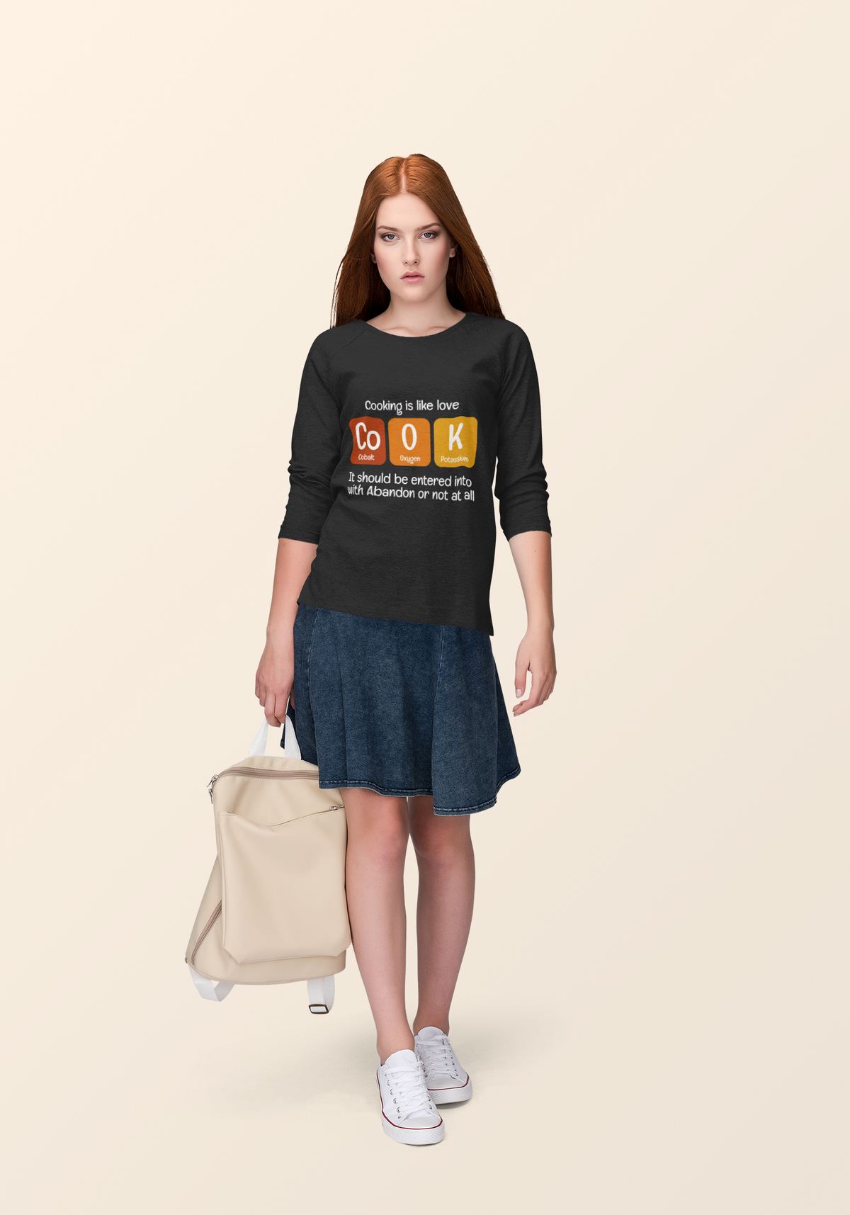 Co-O-K periodic table cook element pun crewneck sweatshirt, lifestyle shot with the design in focus
