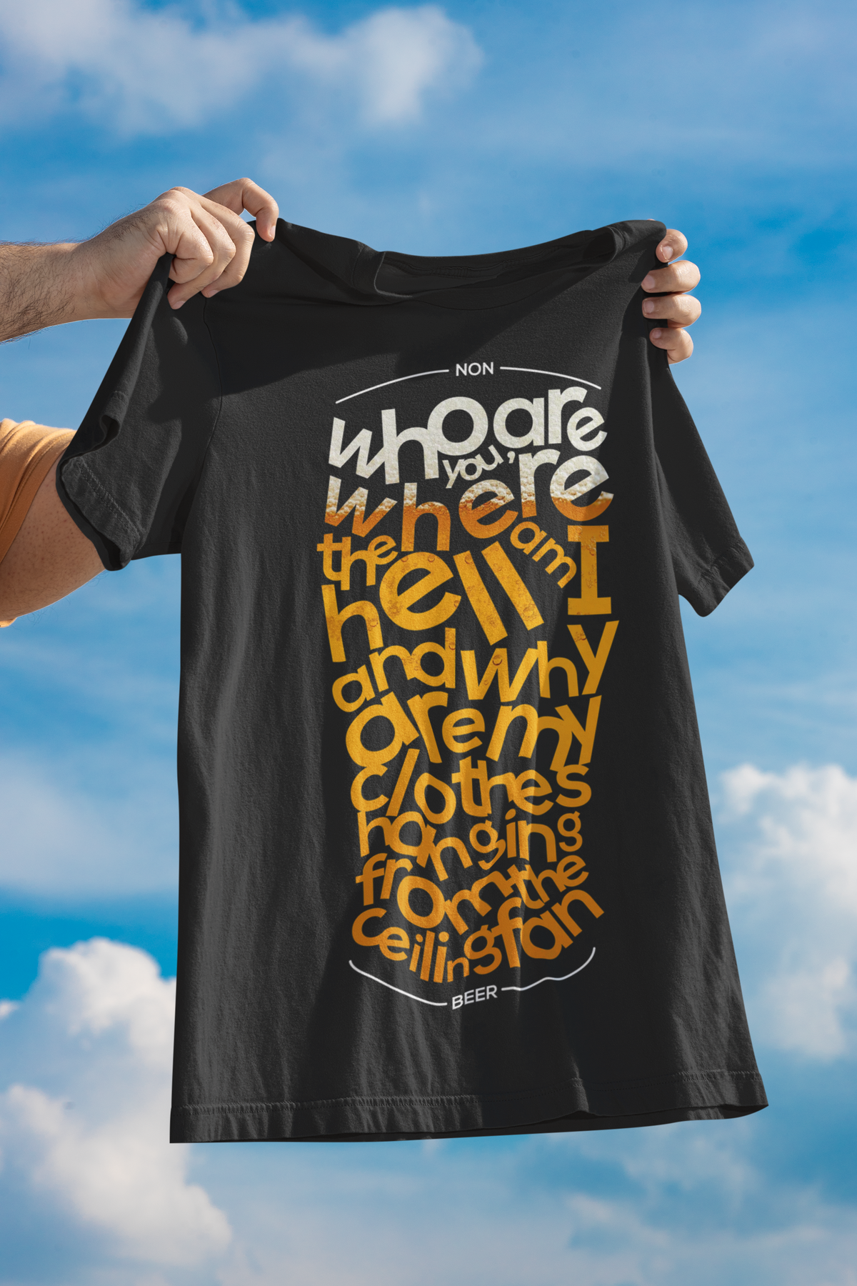 Beer Word Art T-shirt in black, held up against a blue sky, funny gift for beer lovers