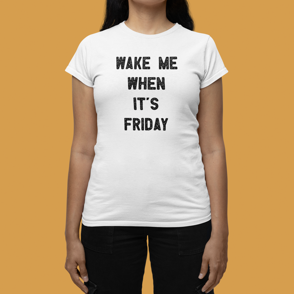 'Wake Me When It's Friday' women's t-shirt in white, woman wearing it, work week graphic tee
