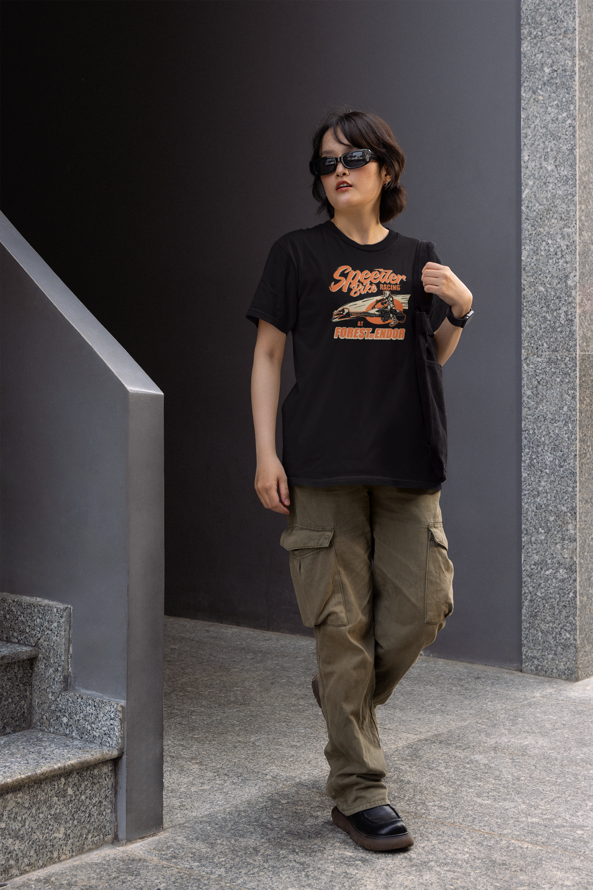 'Speeder Bike Racing' Forest of Endor t-shirt in black, woman outdoors, funny Star Wars tee gift