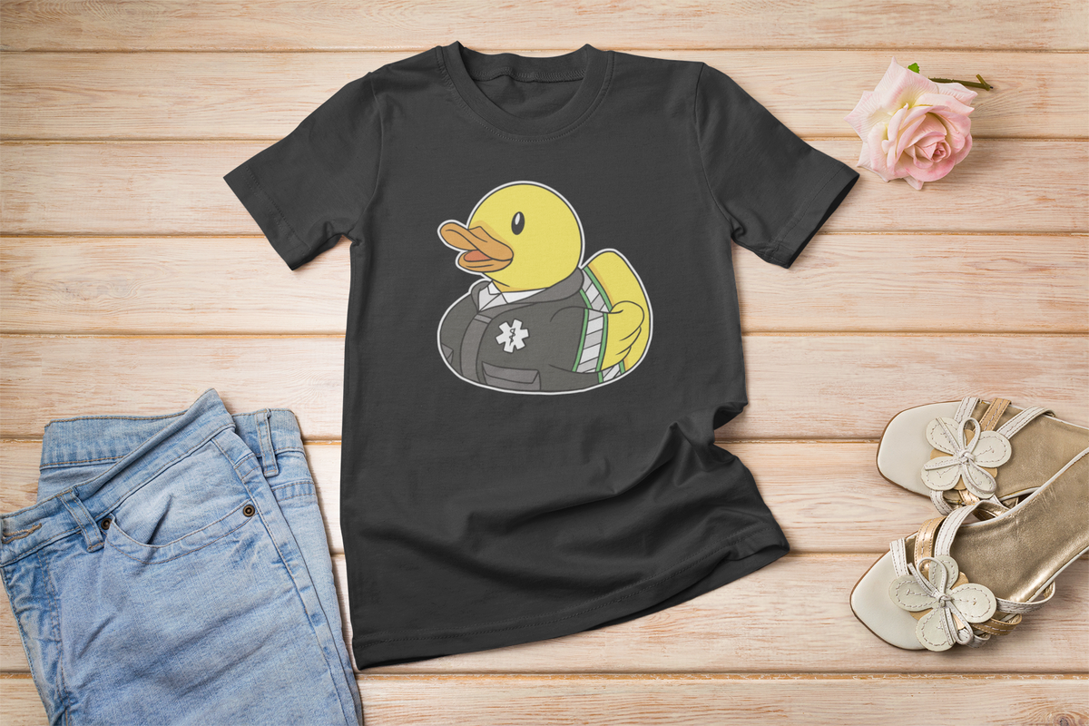 Medical worker duck t-shirt in black, flat lay on a wooden floor with sneakers, funny gift for medical staff