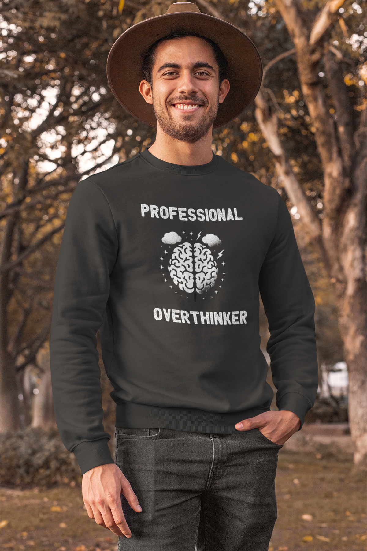 'Professional Overthinker' sweatshirt in charcoal, man wearing it outdoors, funny brain gift for him