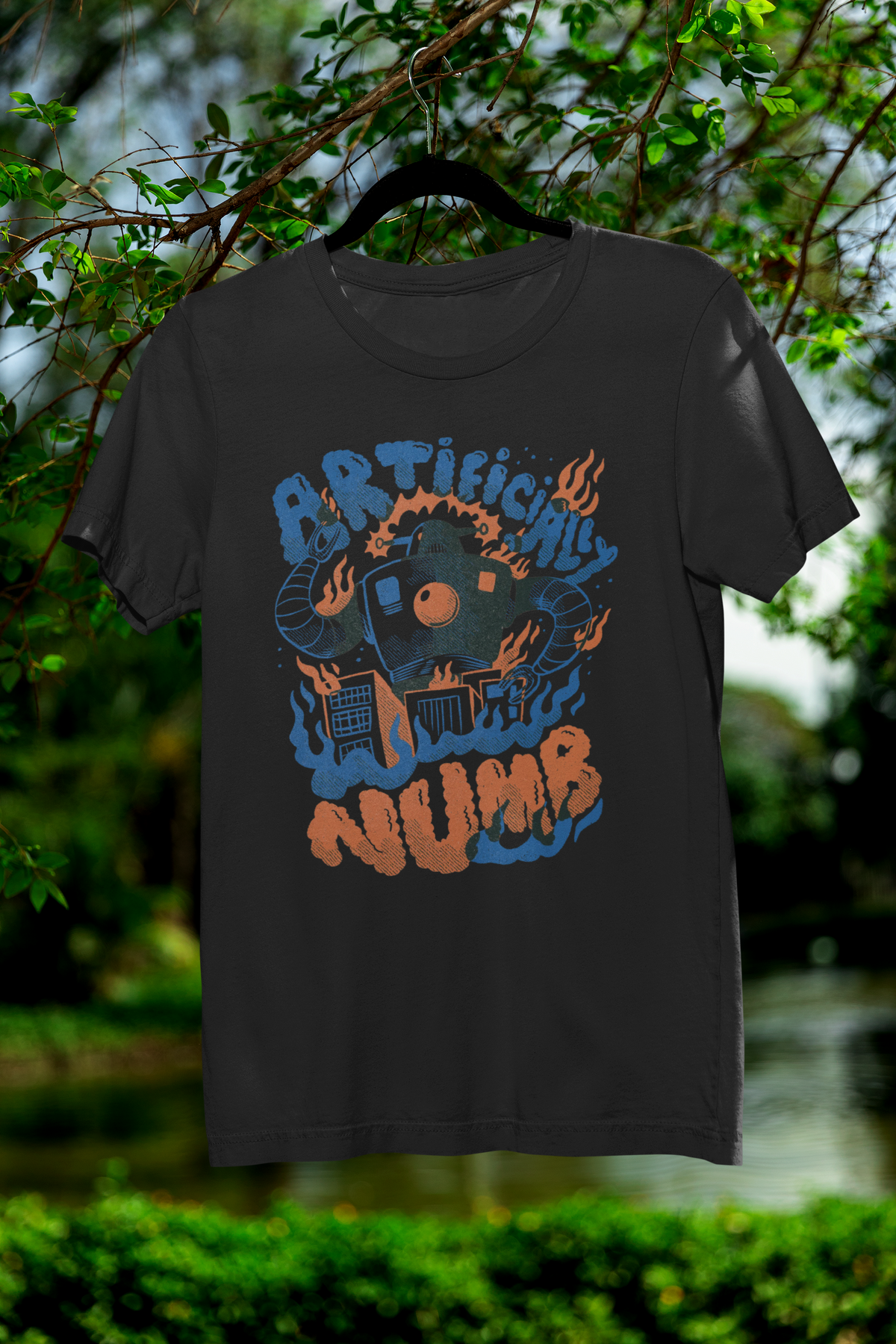 'Artificially Numb' robot t-shirt in black, hanging outdoors, funny gift for sci-fi fans