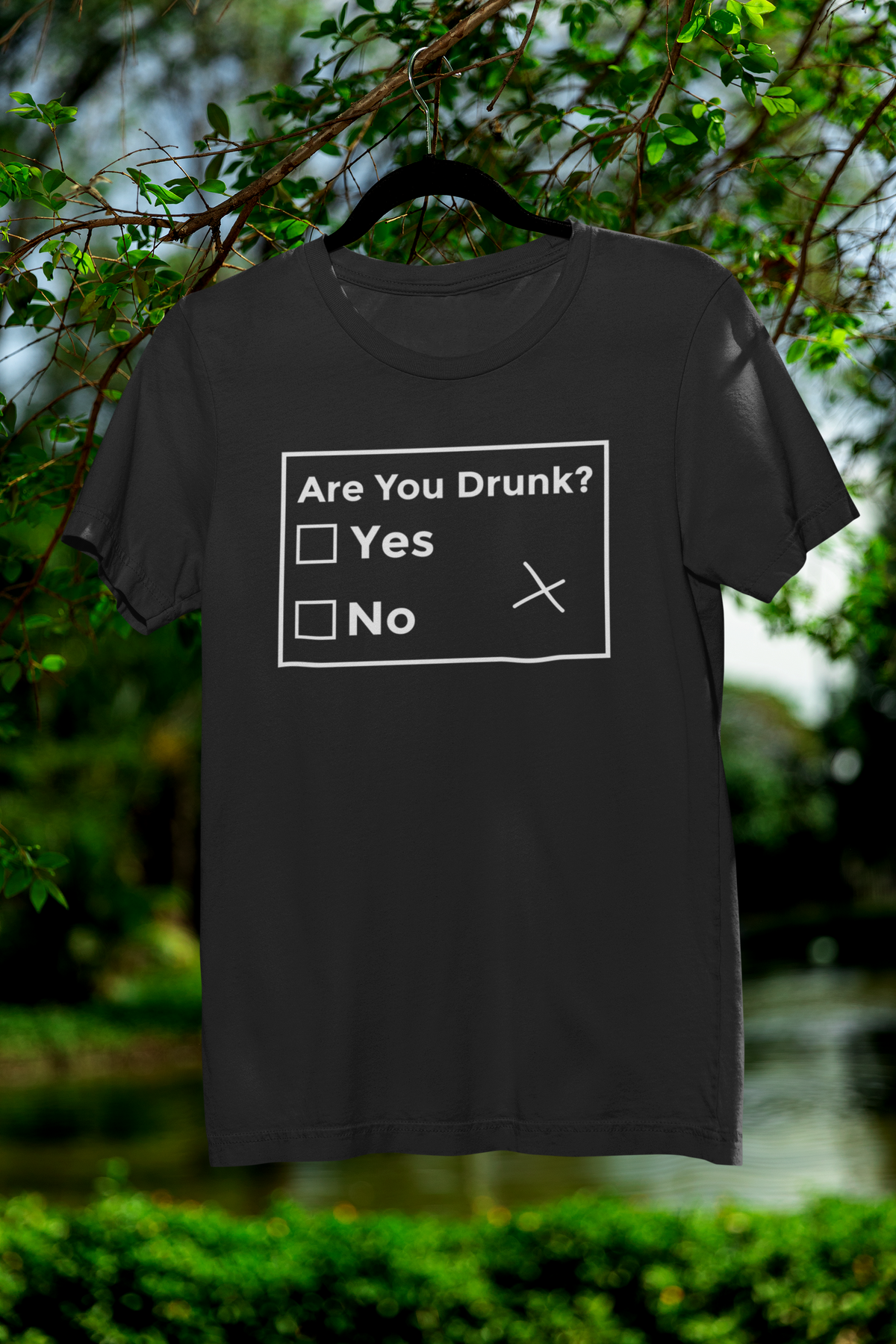 Are You Drunk checklist t-shirt in black, hanging outdoors on a hanger, funny sarcastic party gift shirt