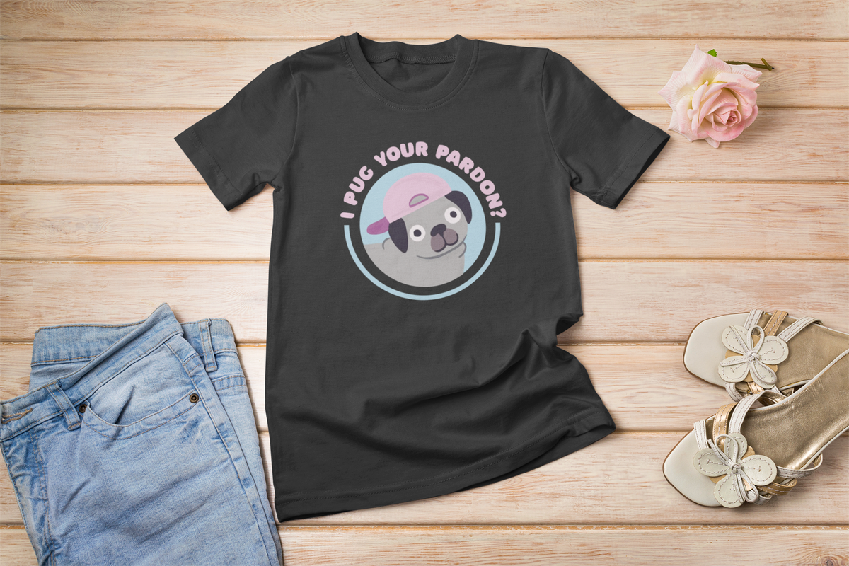 'I Pug Your Pardon' T-shirt in black, flat lay on a wood floor, funny gift for pug lovers