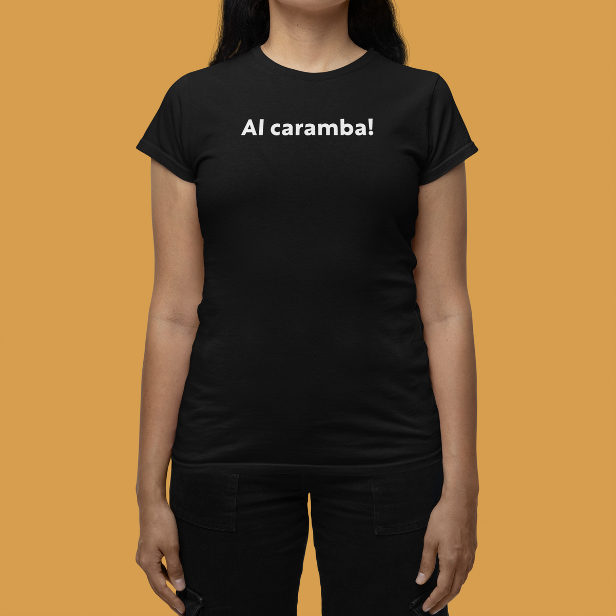 'AI Caramba!' women's tee in black, close-up on woman wearing it, orange background, funny AI shirt