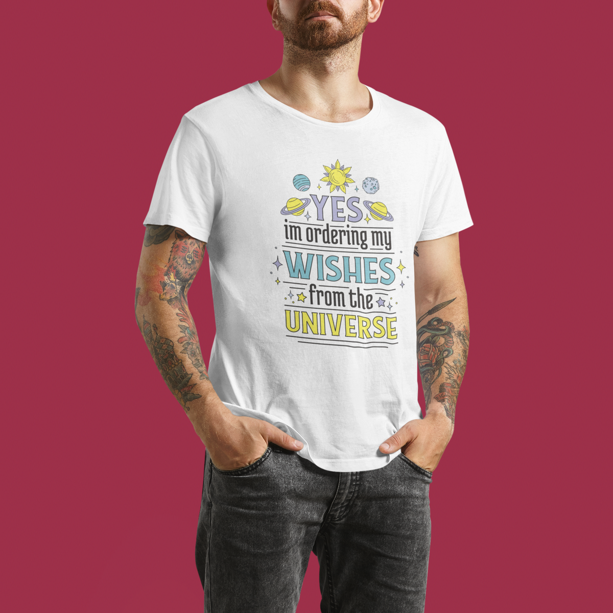 'Yes I'm Ordering My Wishes From The Universe' t-shirt in white, tattooed man wearing it