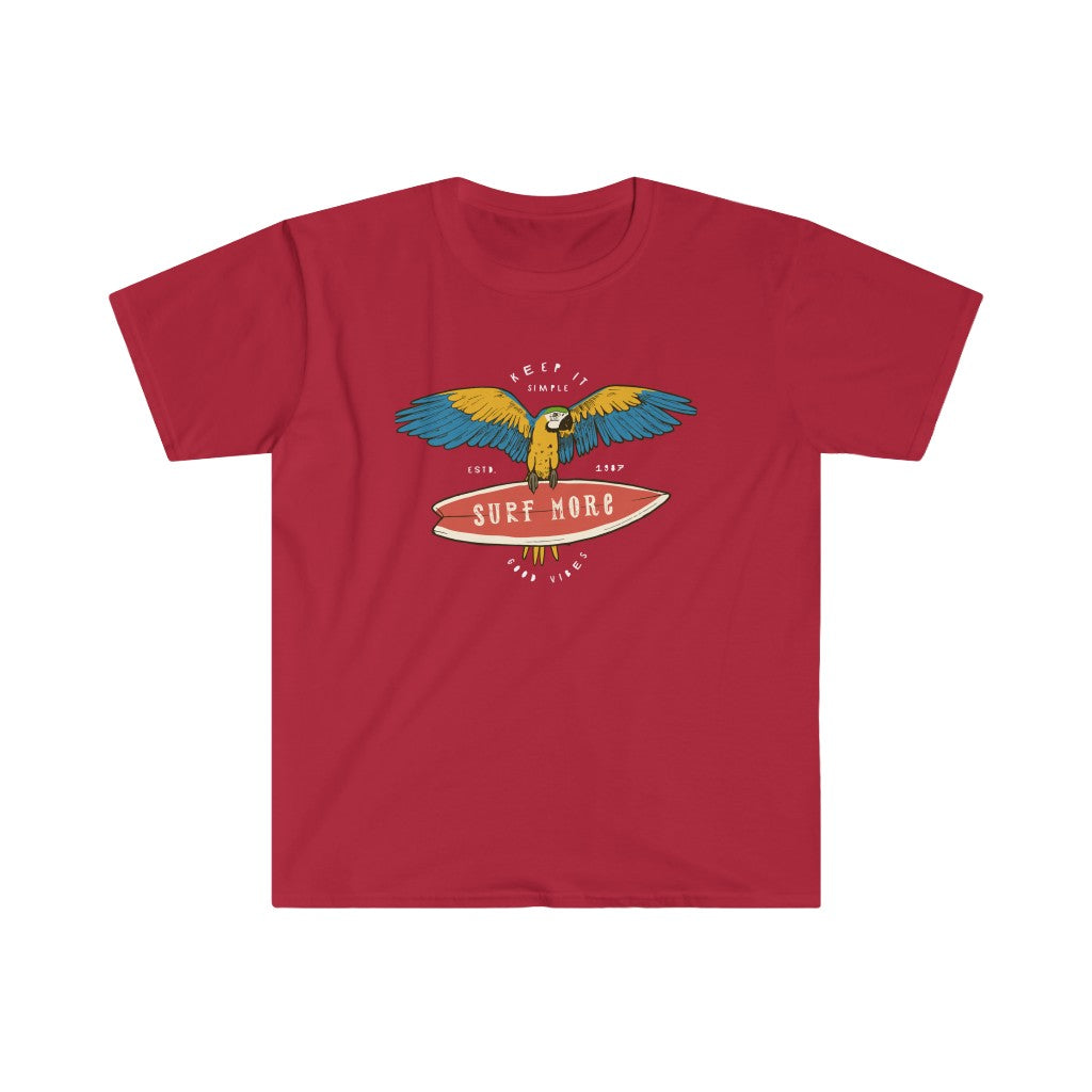A red Surf More T-Shirt with an eagle on a surfboard, perfect for surf enthusiasts.