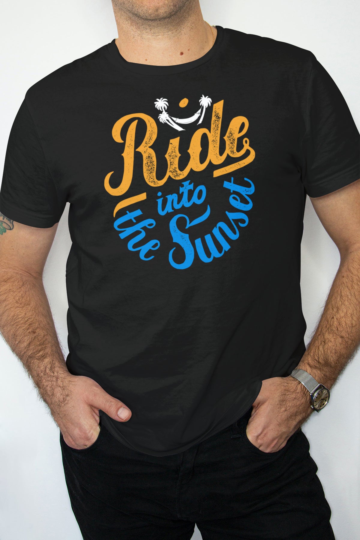 On a sunny day, a man is seen wearing a black Ride Into the Sunshine T-Shirt.
